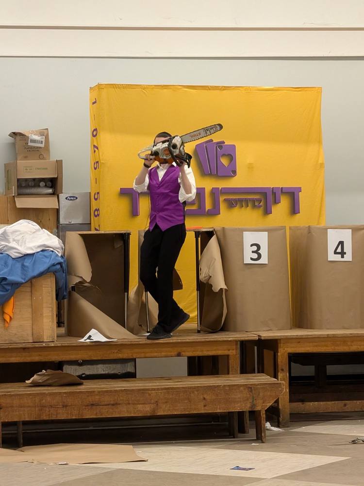A stunt in front of the Dirnfeld Brothers backdrop